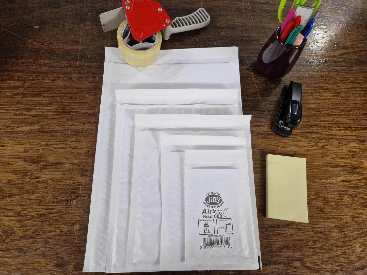 Assorted sizes of Jiffy envelopes: JL000, JL00, JL2, JL4 & JL6. Each size comes in a pack of 10, all in white colour.