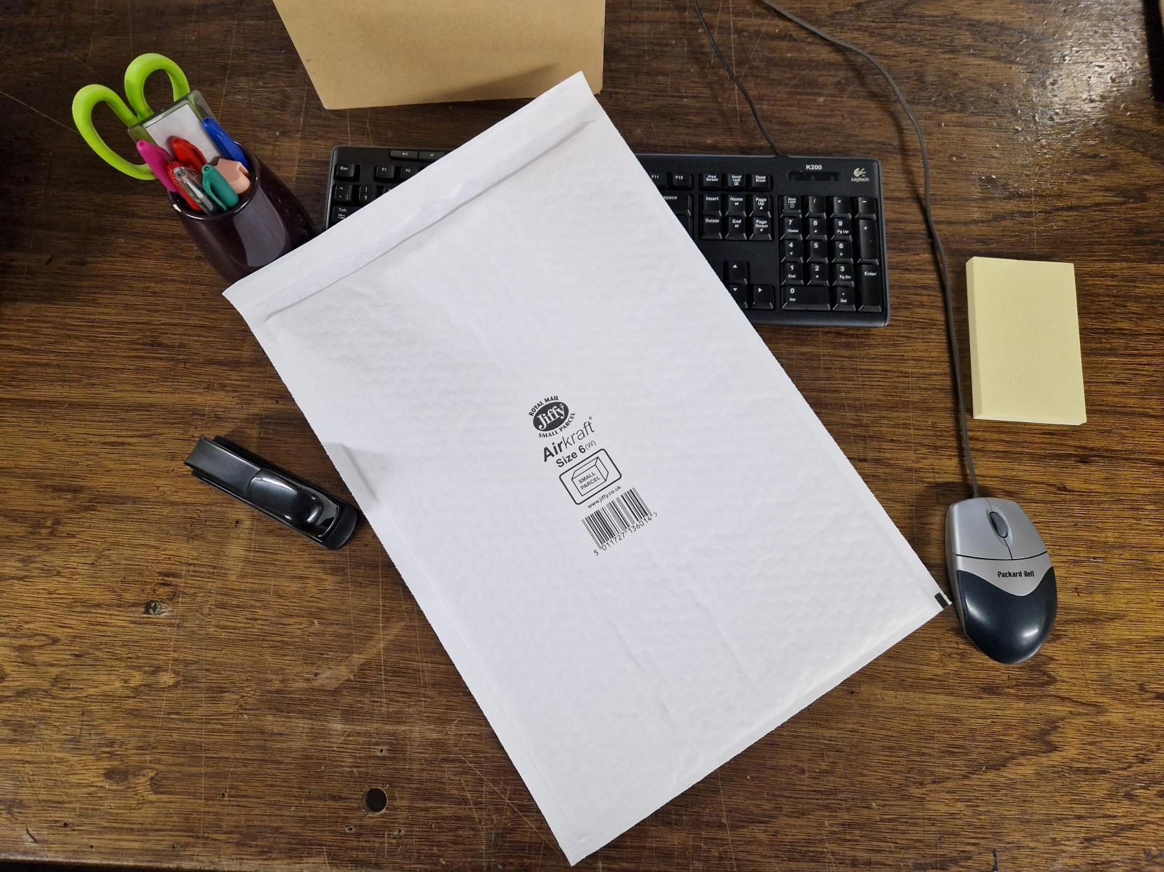 Jiffy Airkraft JL-6 White Bubble Lined Mailer, a compact Jiffy envelope measuring 320mm x 460mm, offering excellent protection during shipping.