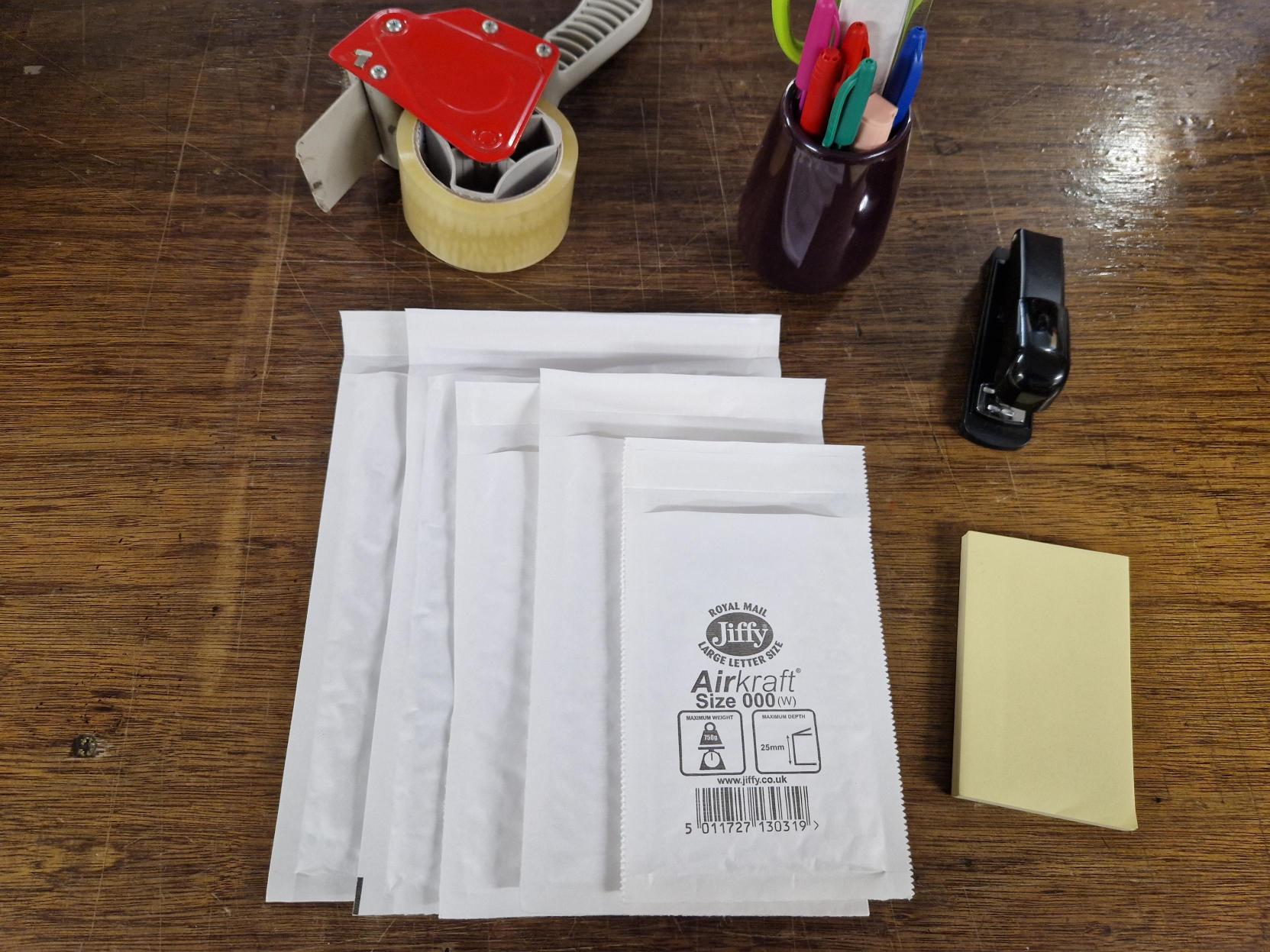 Assorted sizes of Jiffy envelopes: JL000, JL00, JL0, JL1 & JL2. Each size comes in a pack of 10, all in white colour.